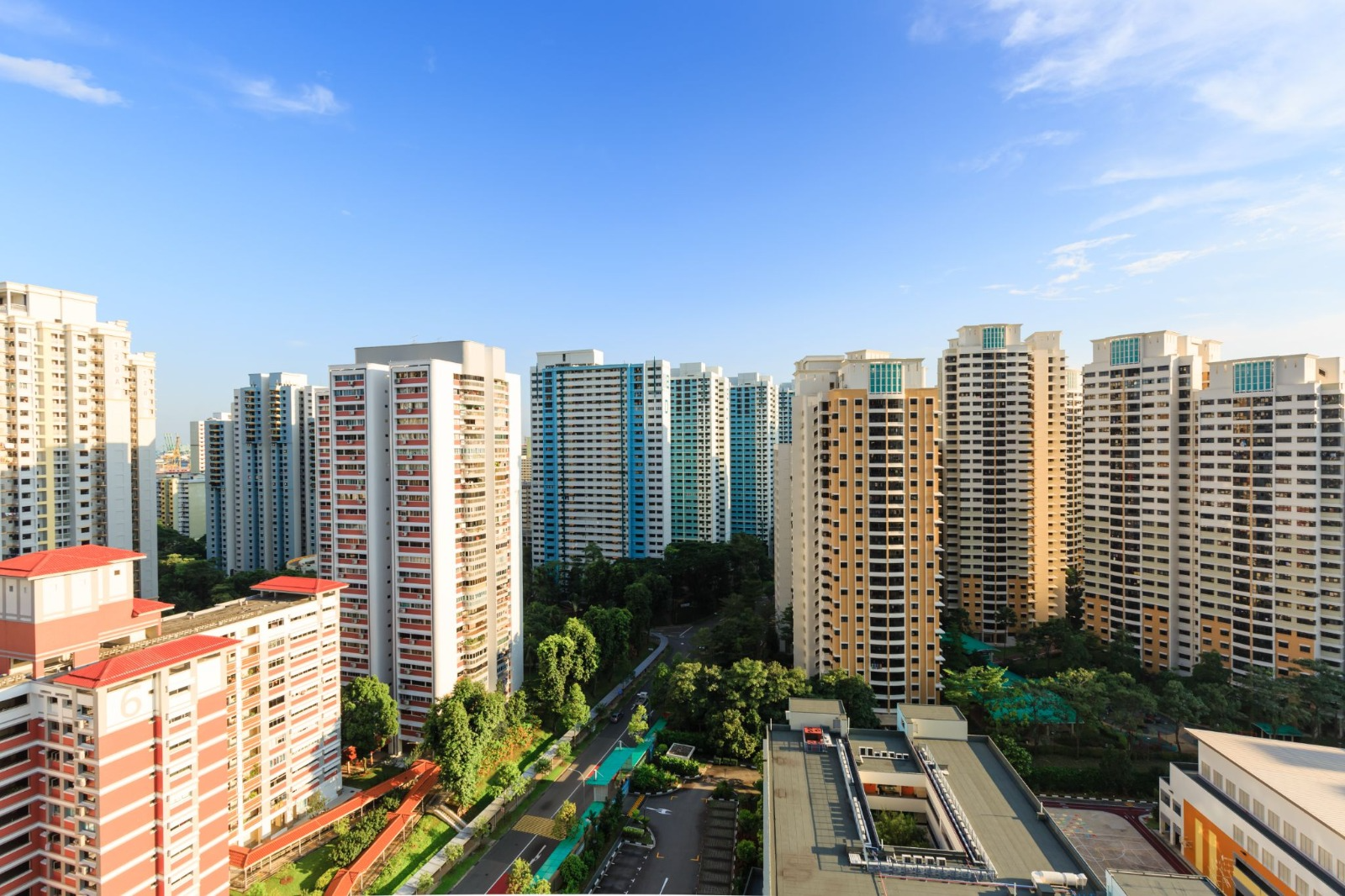 HDB flats in Singapore under a clear blue sky